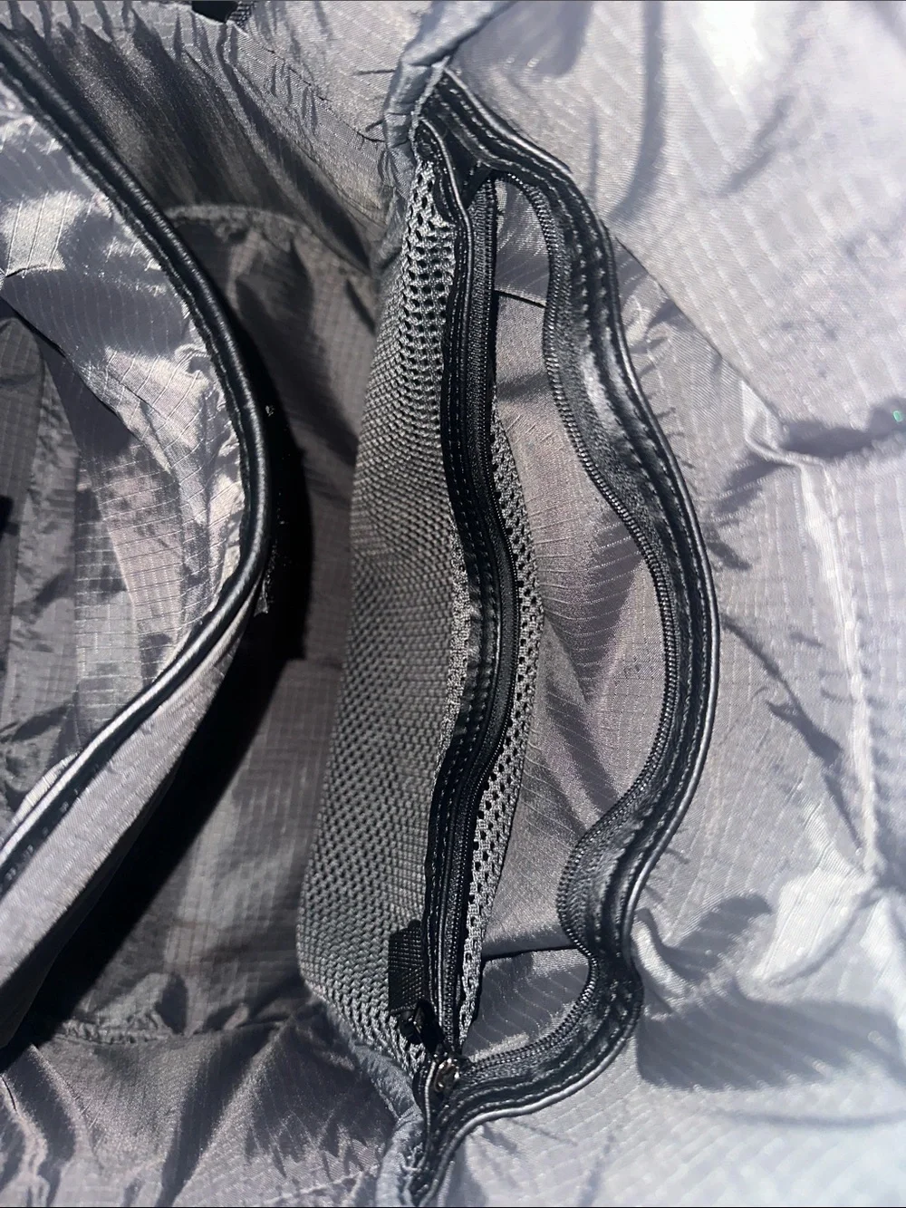 Peloton Black Quilted Men's Backpack with Front Zip Pocket